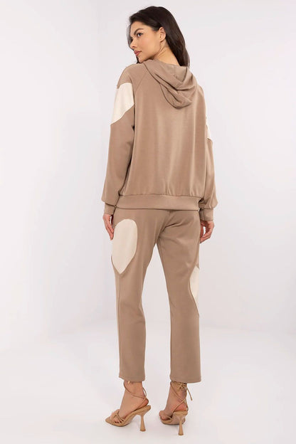 Luxurious Italy Moda Women's Tracksuit Set featuring a stylish hoodie and high-waisted pants made from soft cotton blend. Perfect for casual wear.