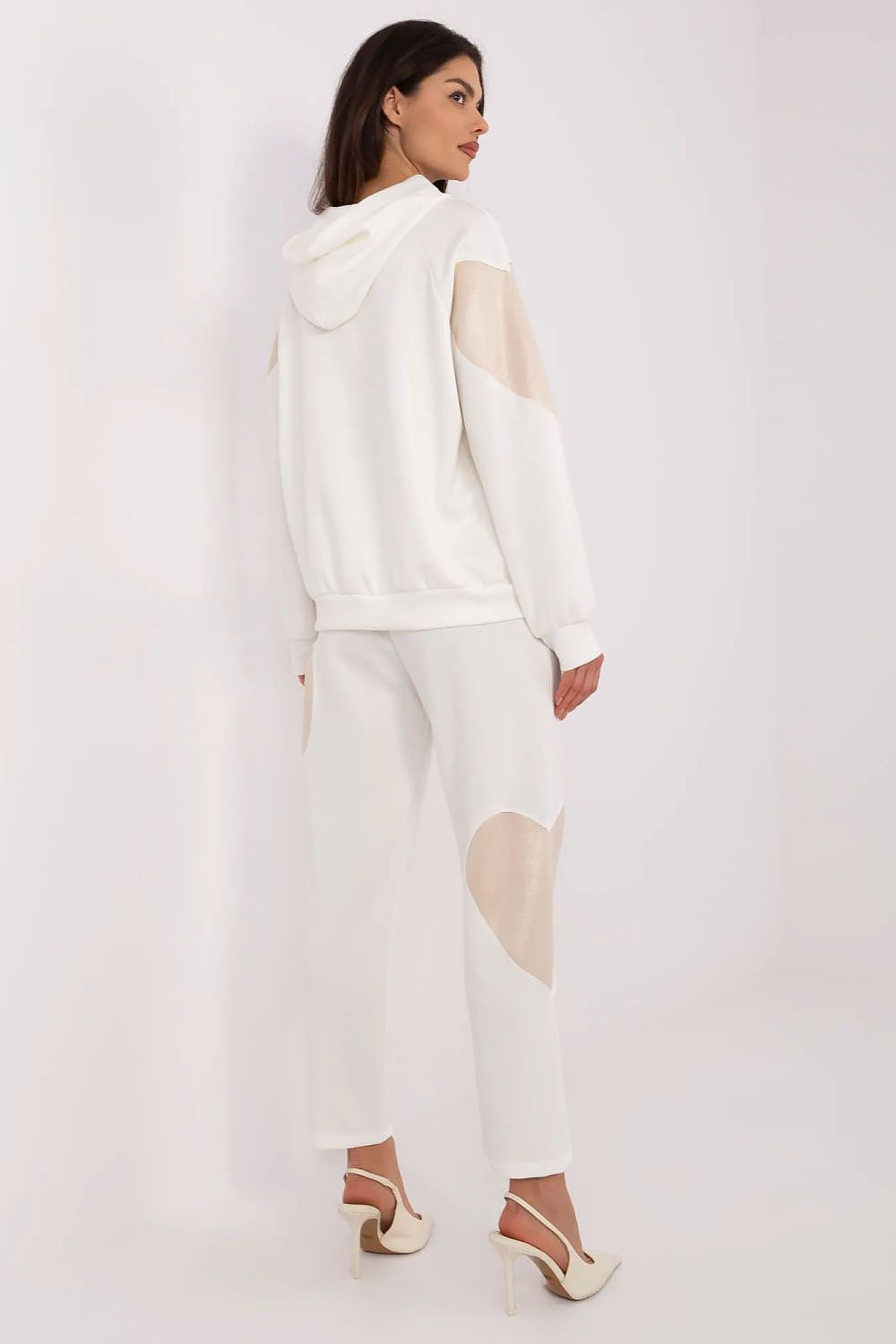 Full view of Italy Moda Women's Luxury Tracksuit Set styled casually, combining comfort and chic aesthetics. Ideal for daily activities and leisure.