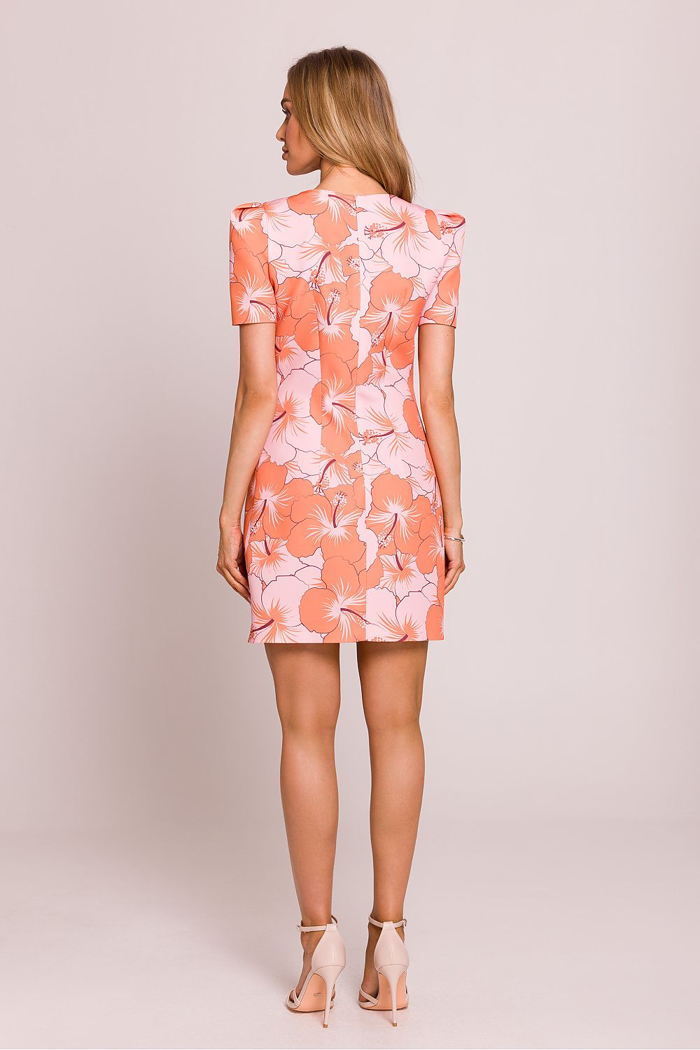 Flat lay of Floral Mini Dress by Moe - Showcasing sophisticated puffed sleeves and fine craftsmanship, perfect for chic summer outings.