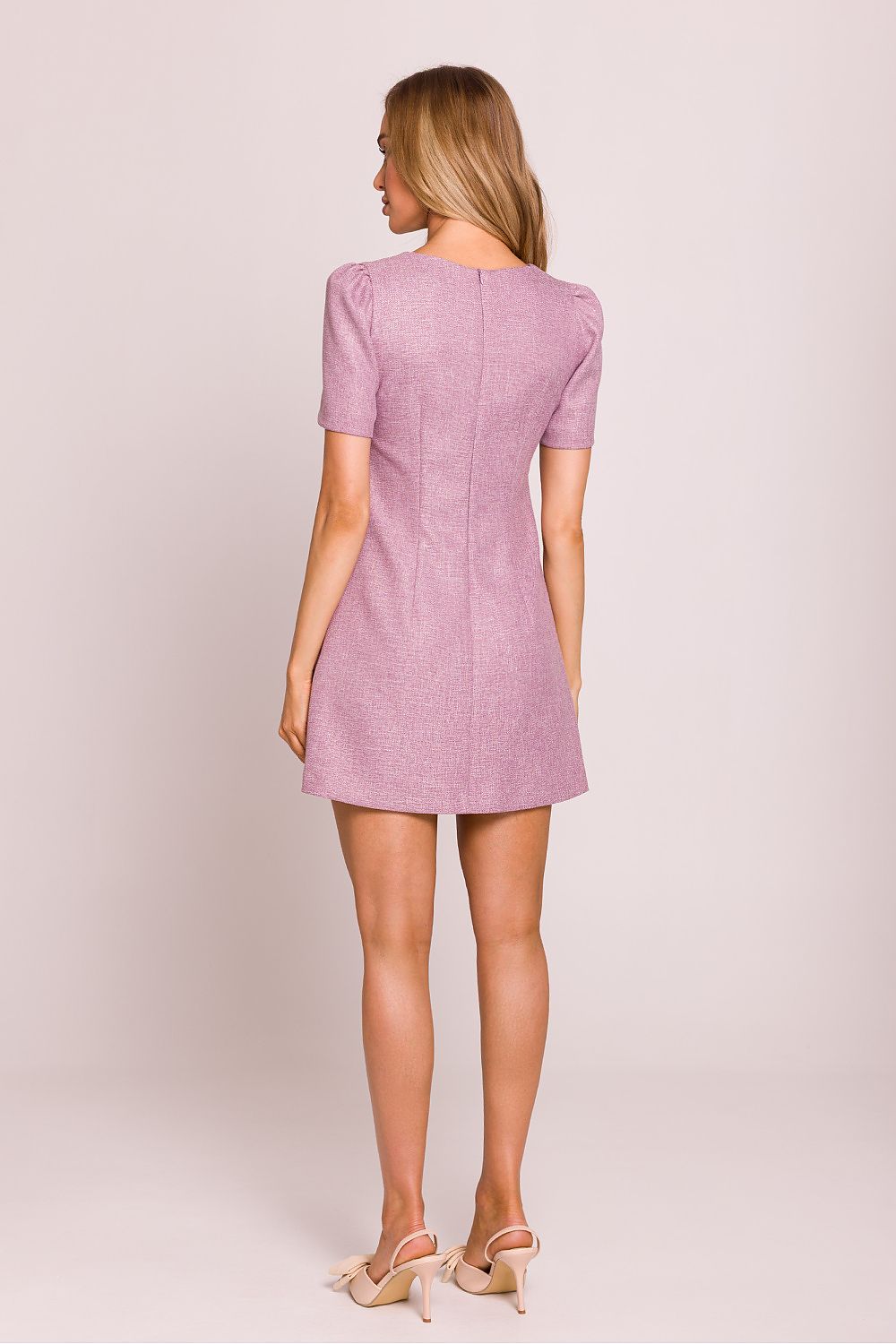 Charming mini dress with a light and airy fabric designed by Moe, accentuating femininity with heart-shaped gold button details.