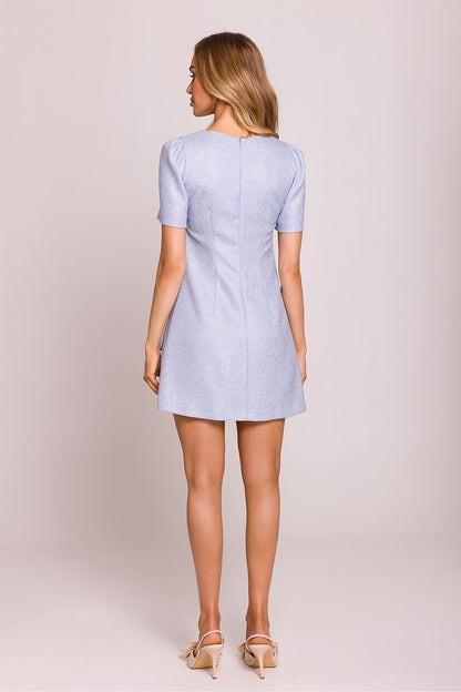 Lightweight and airy trapeze mini dress by Moe, perfect for warm occasions, adorned with decorative heart-shaped buttons.