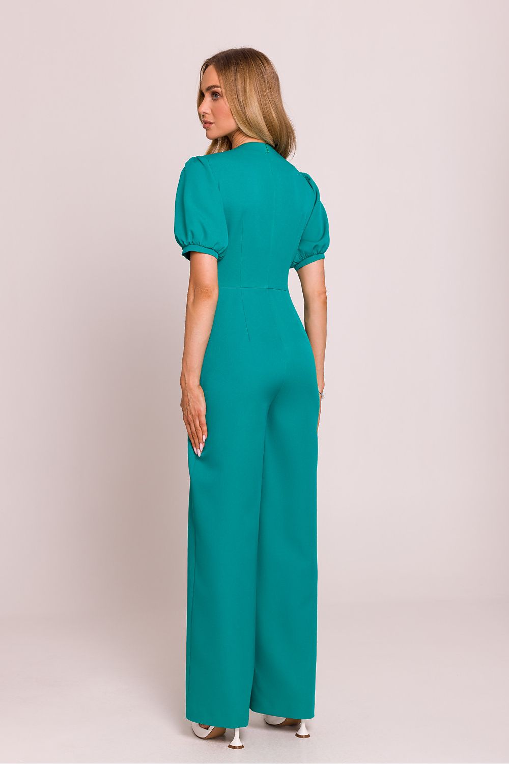 Close-up view of the Moe Women's jumpsuit detailing the romantic short puffy sleeves and flattering silhouette.