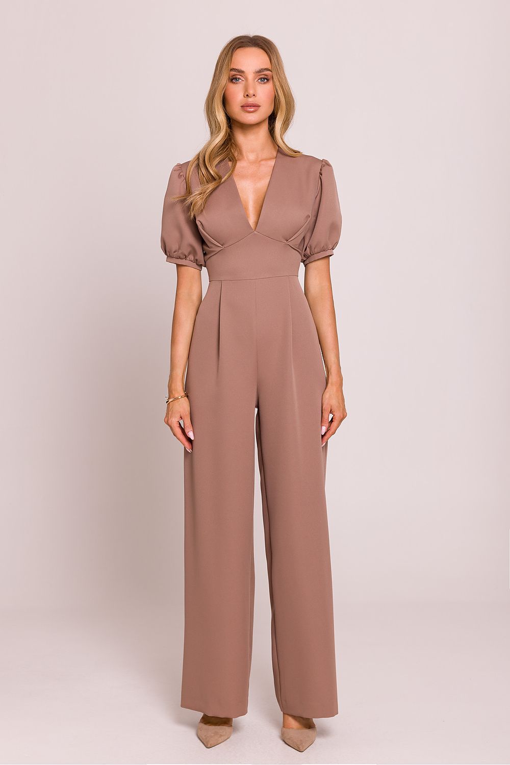The Moe Women's jumpsuit in a stylish pose, highlighting its high-quality fabric and exquisite craftsmanship.