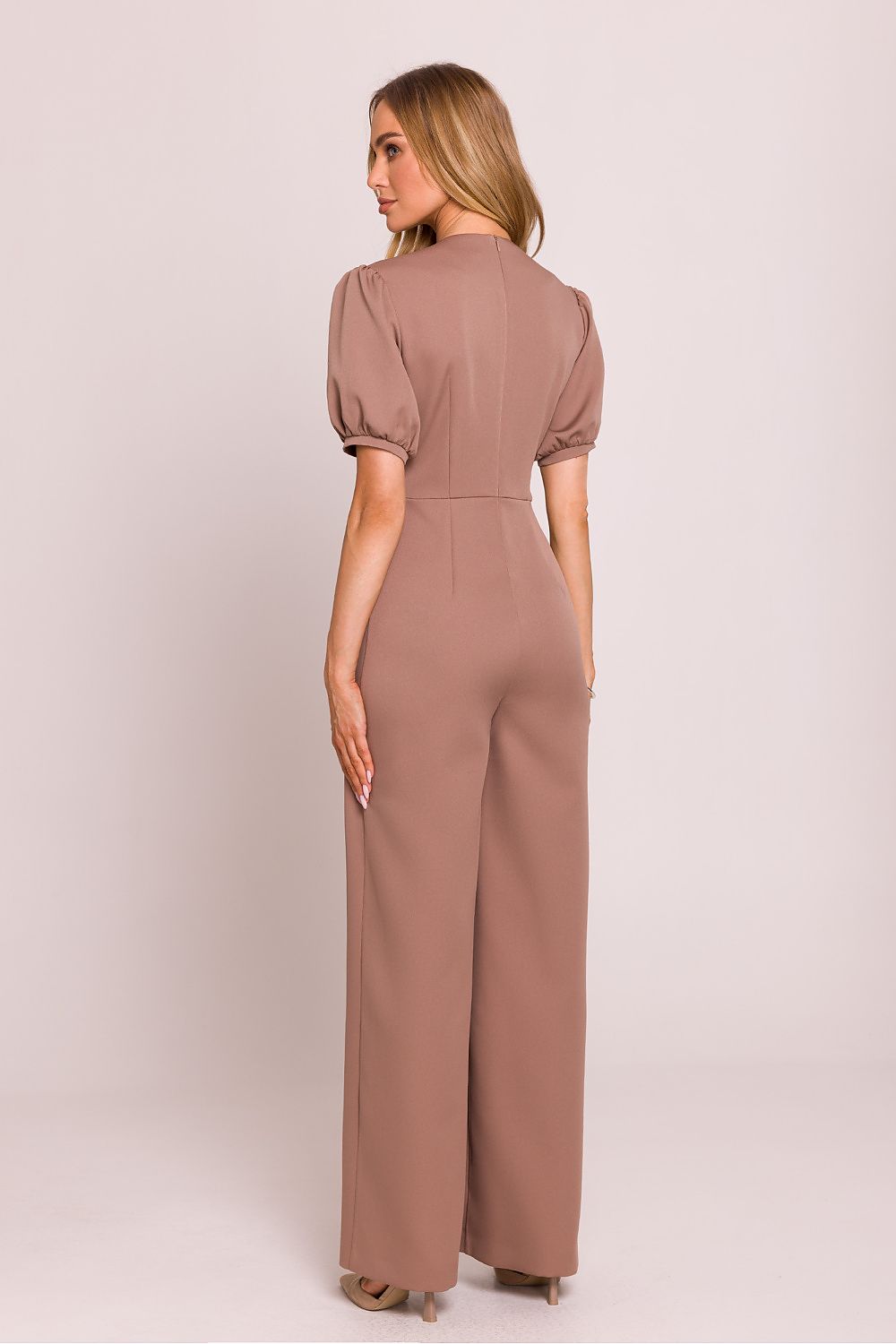 Back view of the Moe Women's jumpsuit showing the concealed zipper and lined top for added comfort and elegance.