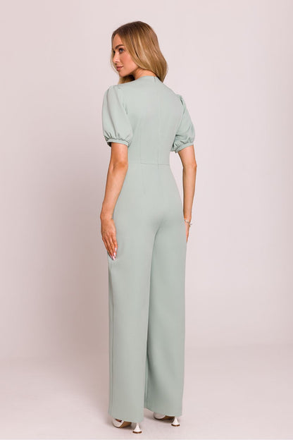 Elegant Moe Women's Jumpsuit in luxurious fabric featuring a deep V-neck and flattering flared trousers. Ideal for chic occasions.