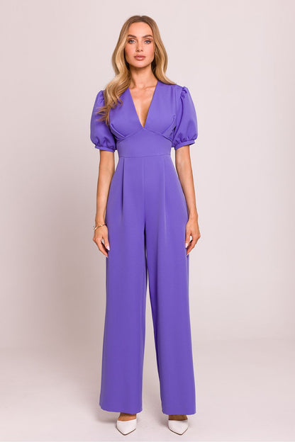 Moe Women's Jumpsuit displayed on a model, demonstrating its stylish flared trousers and feminine cut, perfect for glamorous events.