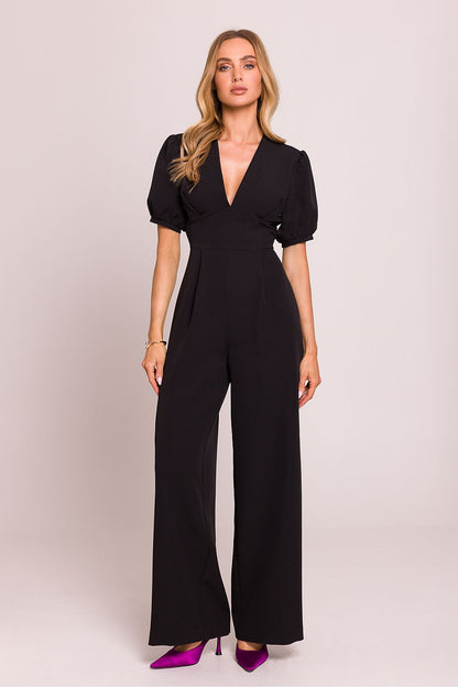 Elegant Moe women's jumpsuit featuring a deep V-neck and flattering flared trousers, showcasing luxury fashion appeal.