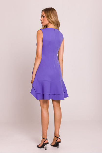 Close-up of the luxurious fabric of the Moe fitted sleeveless dress, showcasing its high-quality texture and elegant design.