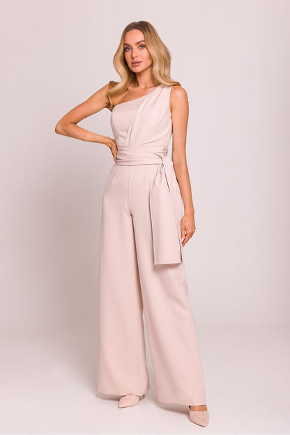Luxurious side view of the Moe asymmetrical jumpsuit showcasing flowing scarves and elegant design.