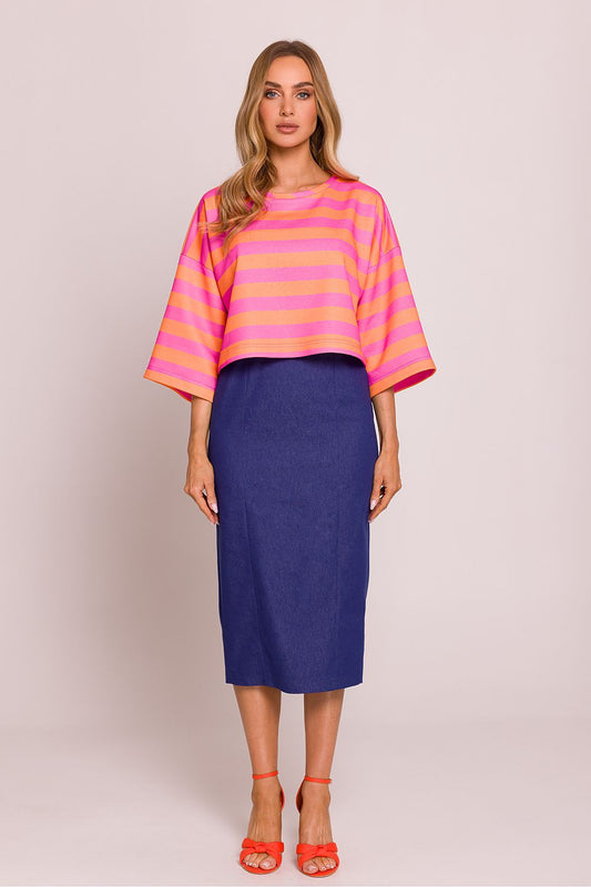 Luxurious Moe striped knit sweater in a comfortable oversized fit, featuring a boat neck design ideal for layering and stylish casual outfits.