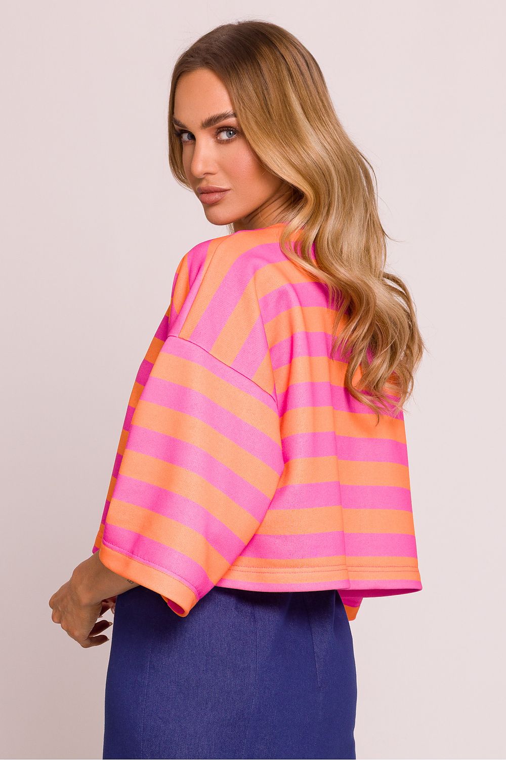 Moe elegant oversized striped knit sweater displayed with intricate details, highlighting comfort and sophistication for both casual and formal occasions.