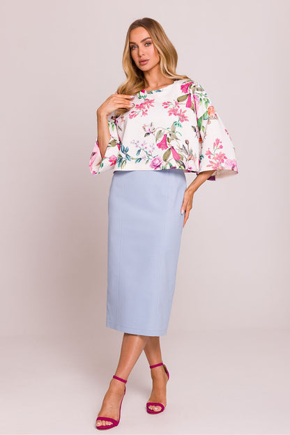 Elegant Moe knit sweater in striped design, showcasing the relaxed boat neck and 3/4 sleeves, ideal for versatile styling.