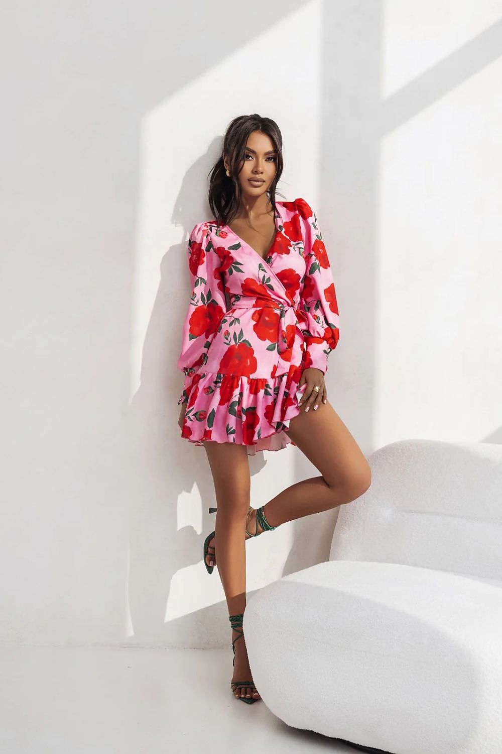 Close-up of LaBalancia long sleeve wrap dress showcasing the delicate fabric texture and feminine tie waist detail.