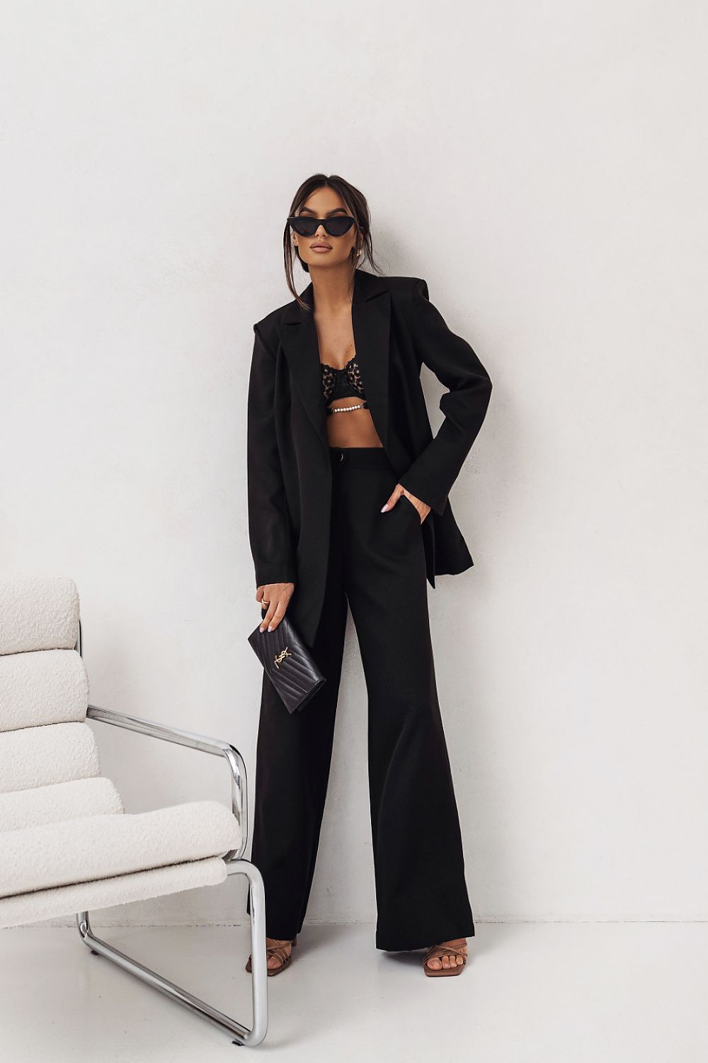 Detail of LaBalancia stylish fuchsia jacket, emphasising exquisite tailoring and the soft texture of high-quality materials.