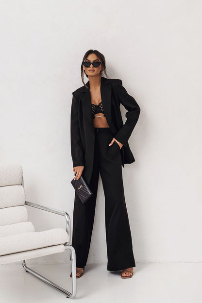 Detail of LaBalancia stylish fuchsia jacket, emphasising exquisite tailoring and the soft texture of high-quality materials.