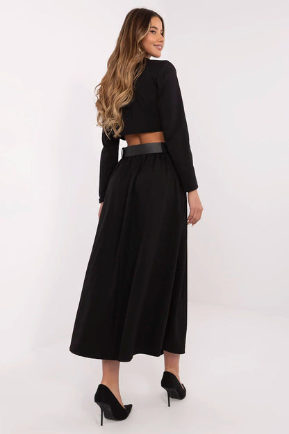 Elegant long maxi skirt with side pockets by Italy Moda, featuring an elastic waist and sophisticated front pleats, perfect for both everyday and formal occasions.