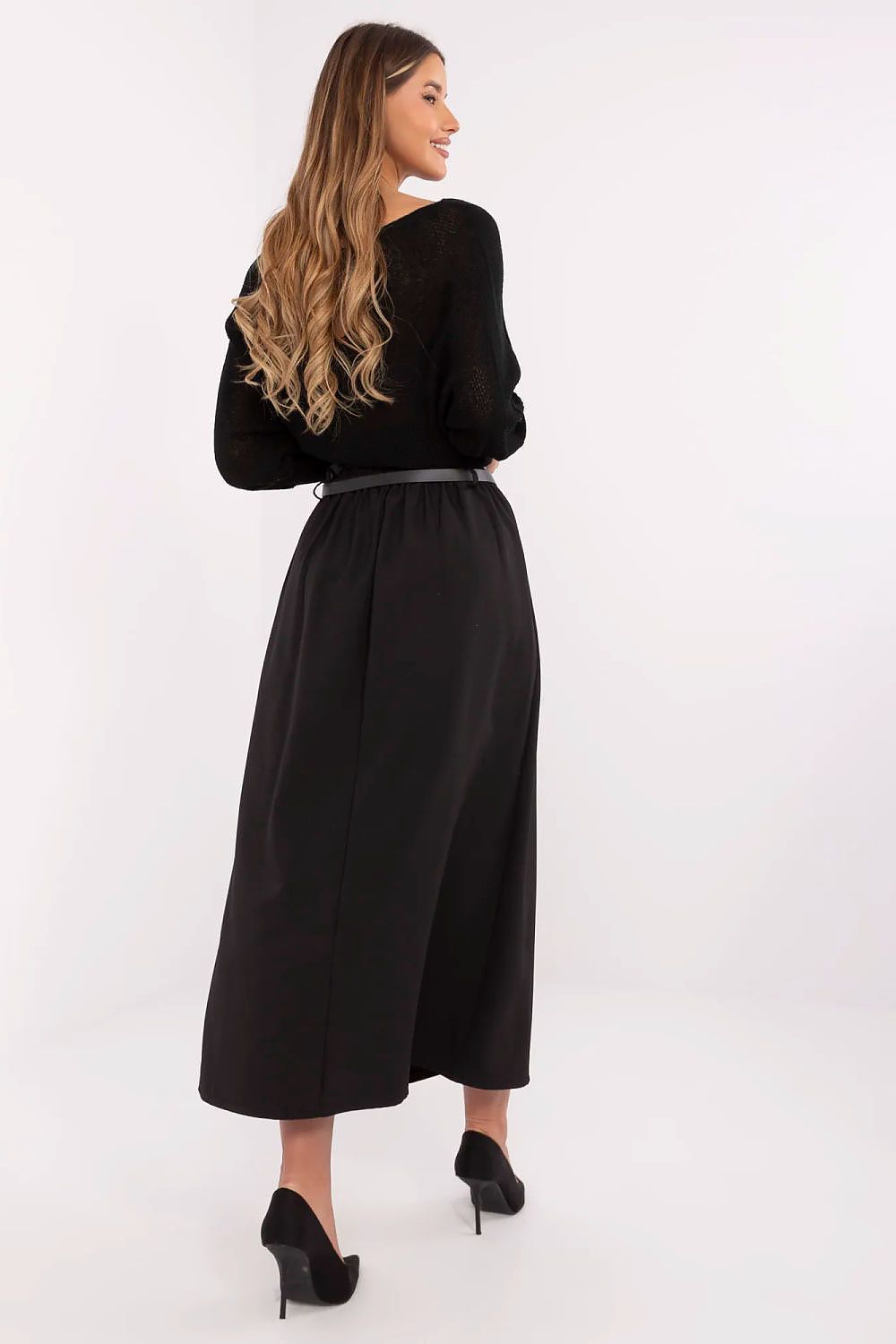 Comfortable polyester and spandex blend maxi skirt by Italy Moda, designed for a flawless fit and sophistication.