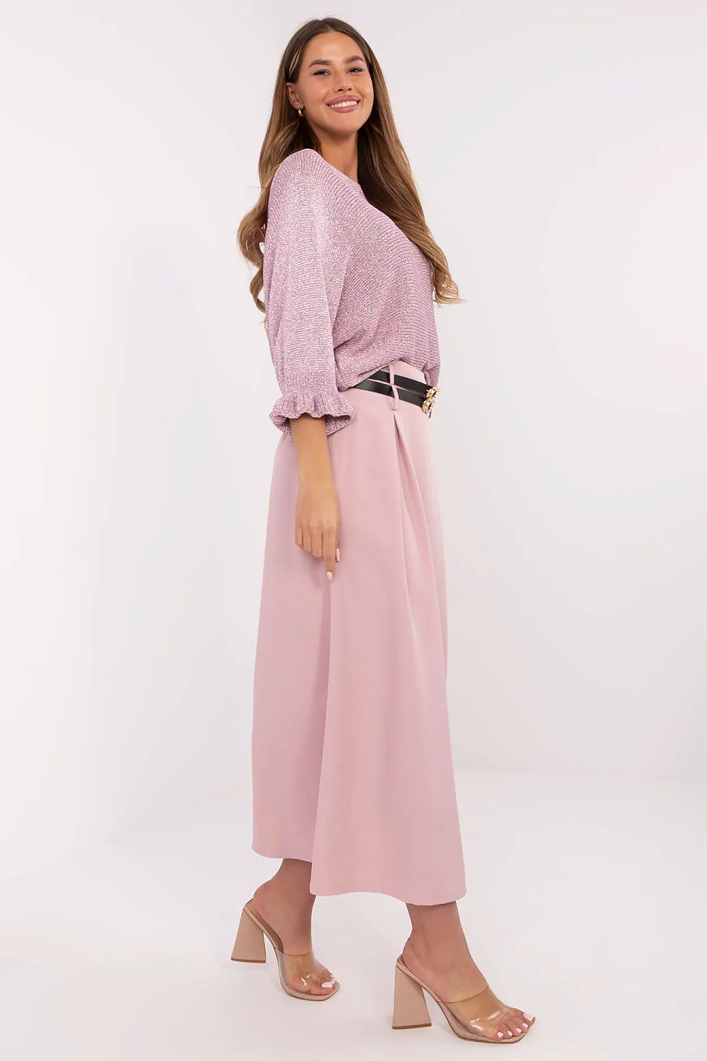Sophisticated maxi skirt by Italy Moda with distinctive belt accents and a luxurious feel.