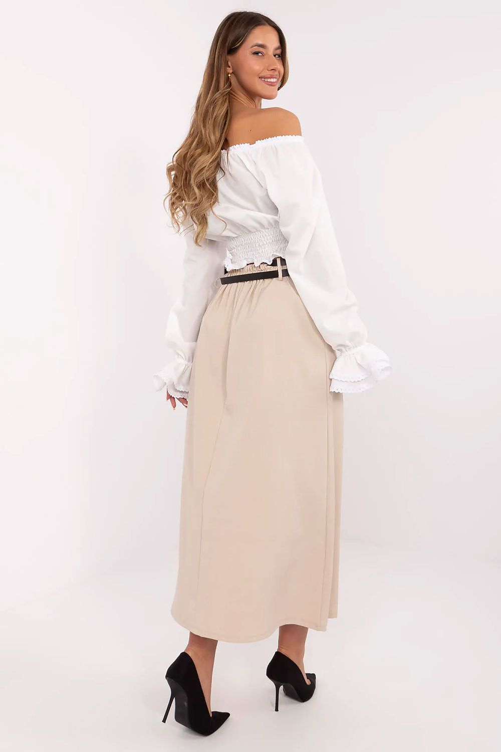 Model wearing Italy Moda's elegant maxi skirt, demonstrating its versatility for both casual and formal occasions.