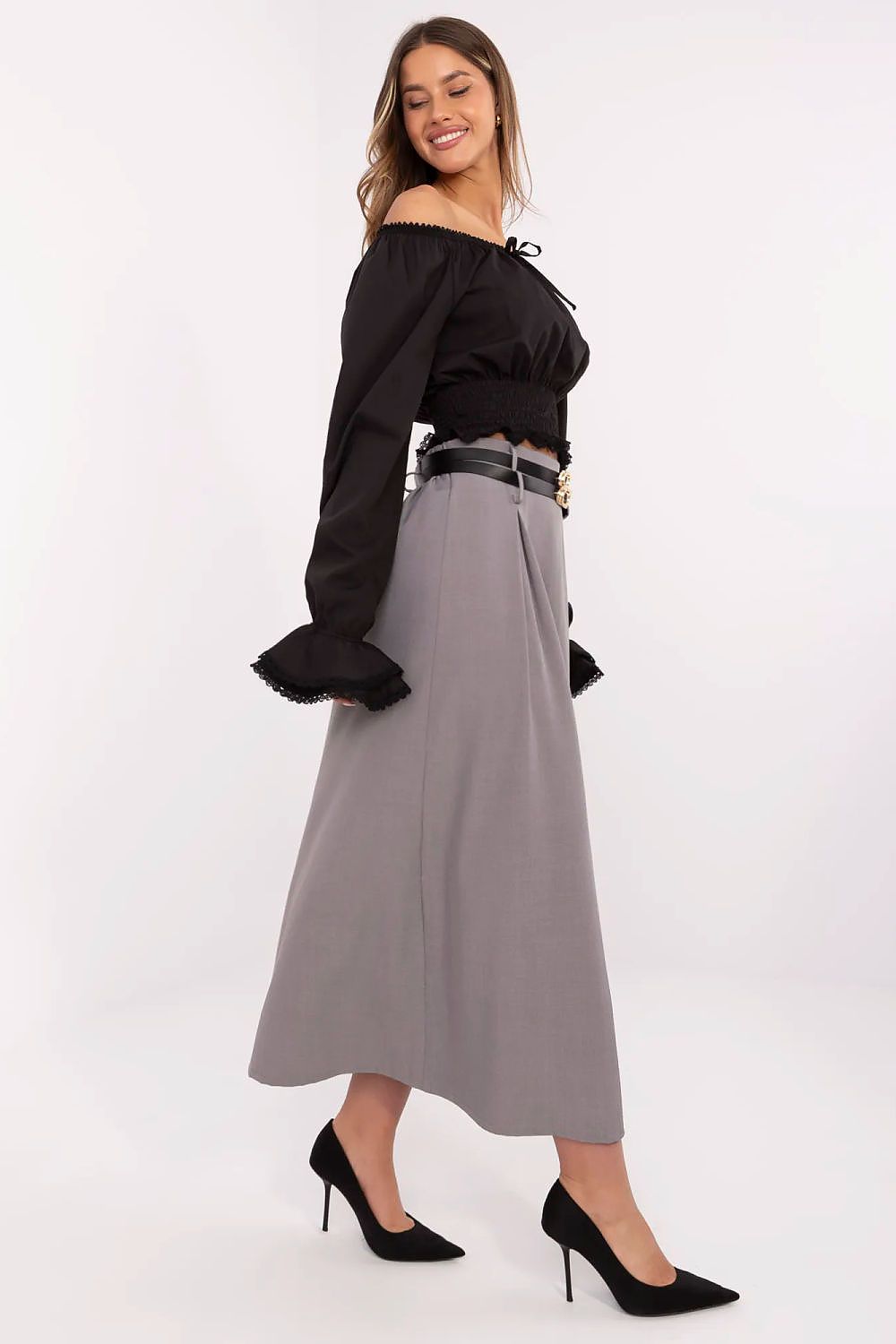 Fashion detail of Italy Moda's elegant maxi skirt featuring tightly fastened belts to accentuate the waist.