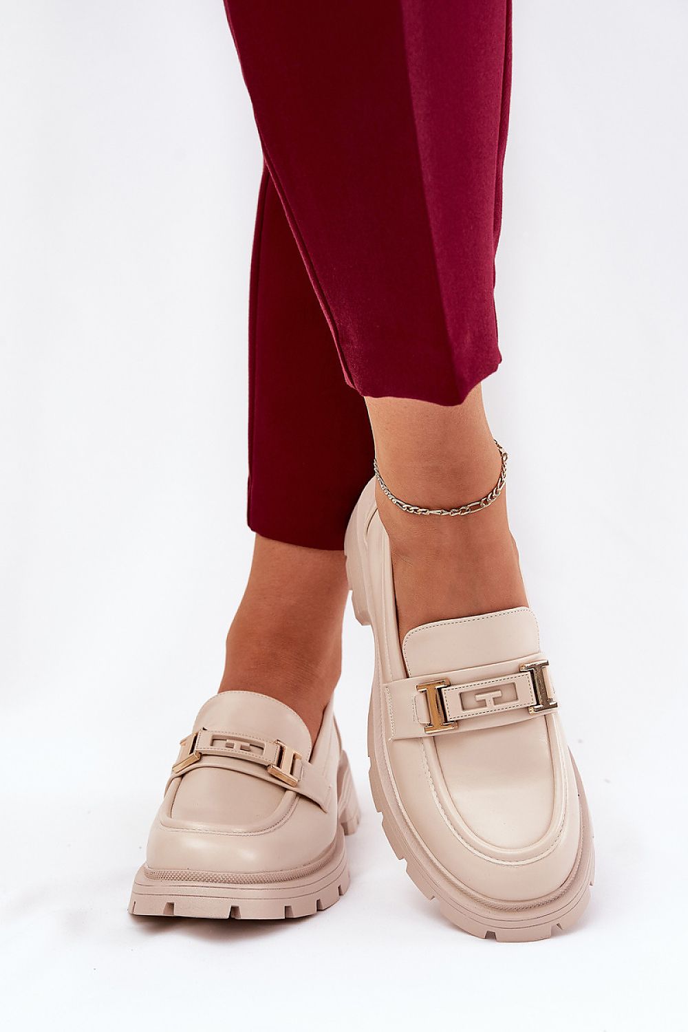 Step in Style women's moccasin heel boots made of eco leather, showcasing a chic design ideal for both casual and elegant outfits.
