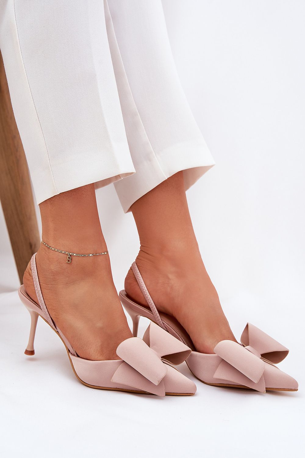 Elegant women's high heels with bow by Step in Style, featuring an open heel design and 8cm heel height, perfect for stylish outings and sophisticated occasions.