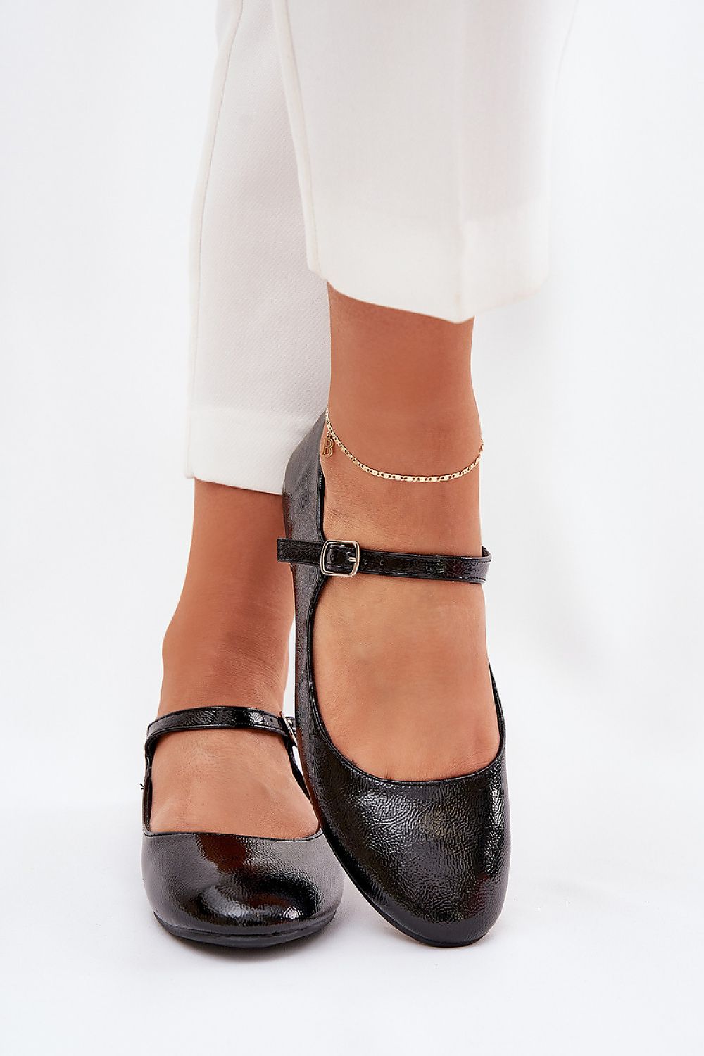 Luxurious Women's Ballerina Flats in glossy patent eco leather by Step in style, elegantly designed with a fashionable strap and essential comfort for all-day wear.