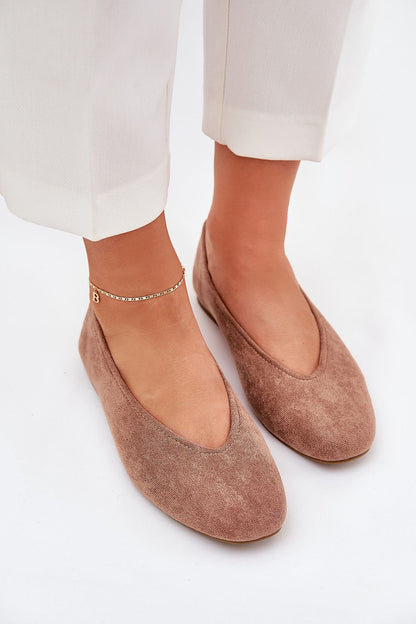Image featuring Step in Style eco-suede ballet flats elegantly paired with casual attire, emphasizing their versatility and refined style.