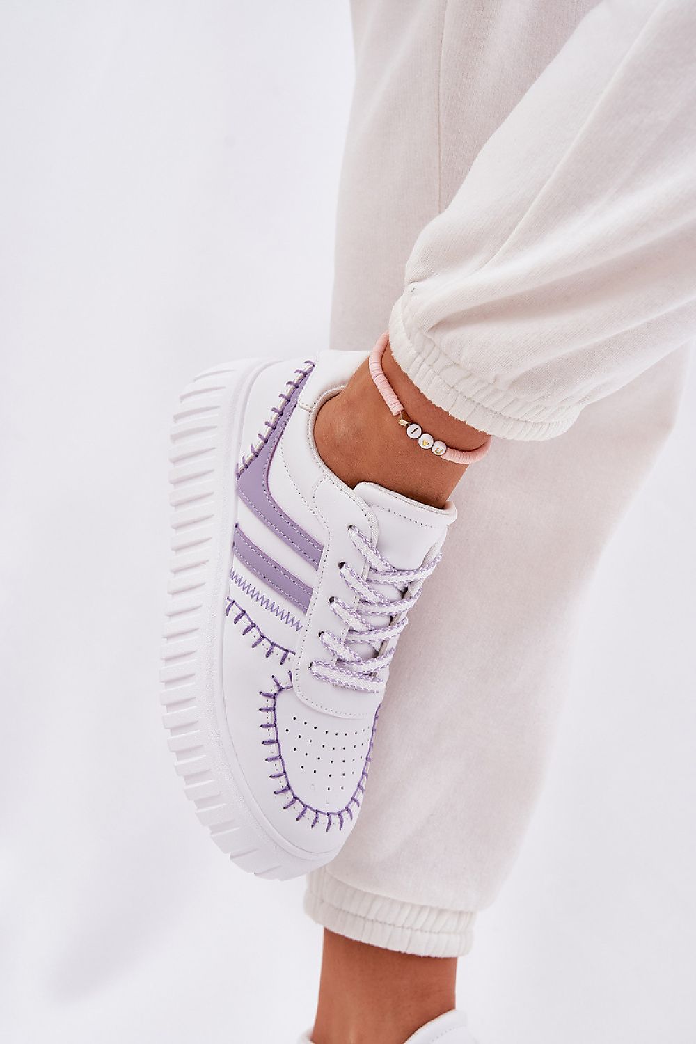 Close-up view of Step in Style eco leather women's sneakers featuring a cushioned foam insole and rounded toe design for enhanced comfort and luxury aesthetics.
