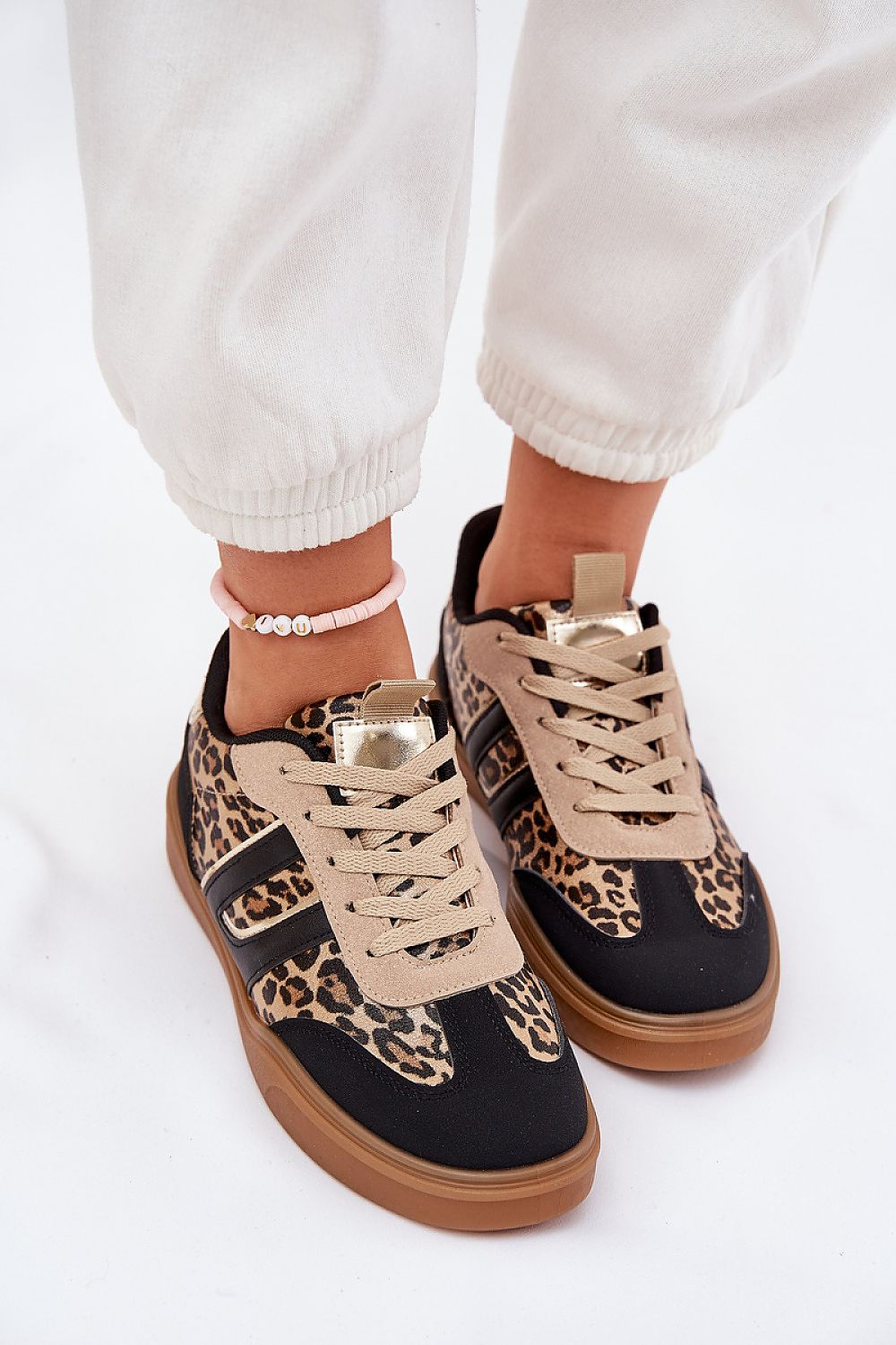 Elegant Eco-Friendly Women's Low-Top Sneakers by Step in Style, crafted from sustainable materials with traditional lacing for a perfect fit.
