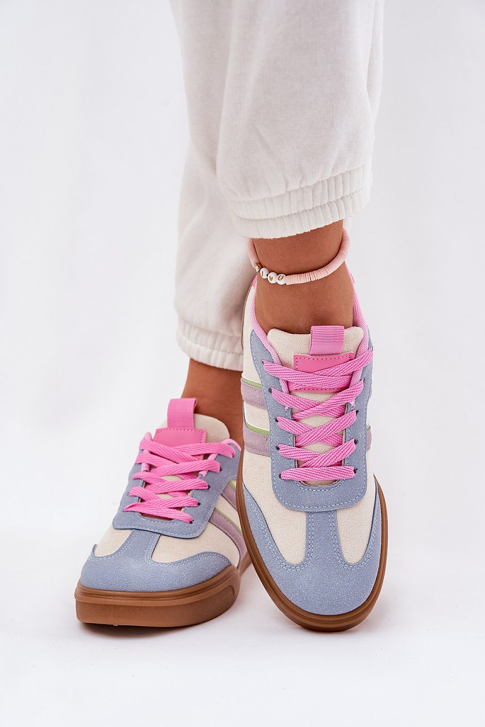Step in Style eco-friendly women's low-top sneakers featuring a chic silhouette, available in EU sizes 36-41, perfect for the eco-conscious consumer.