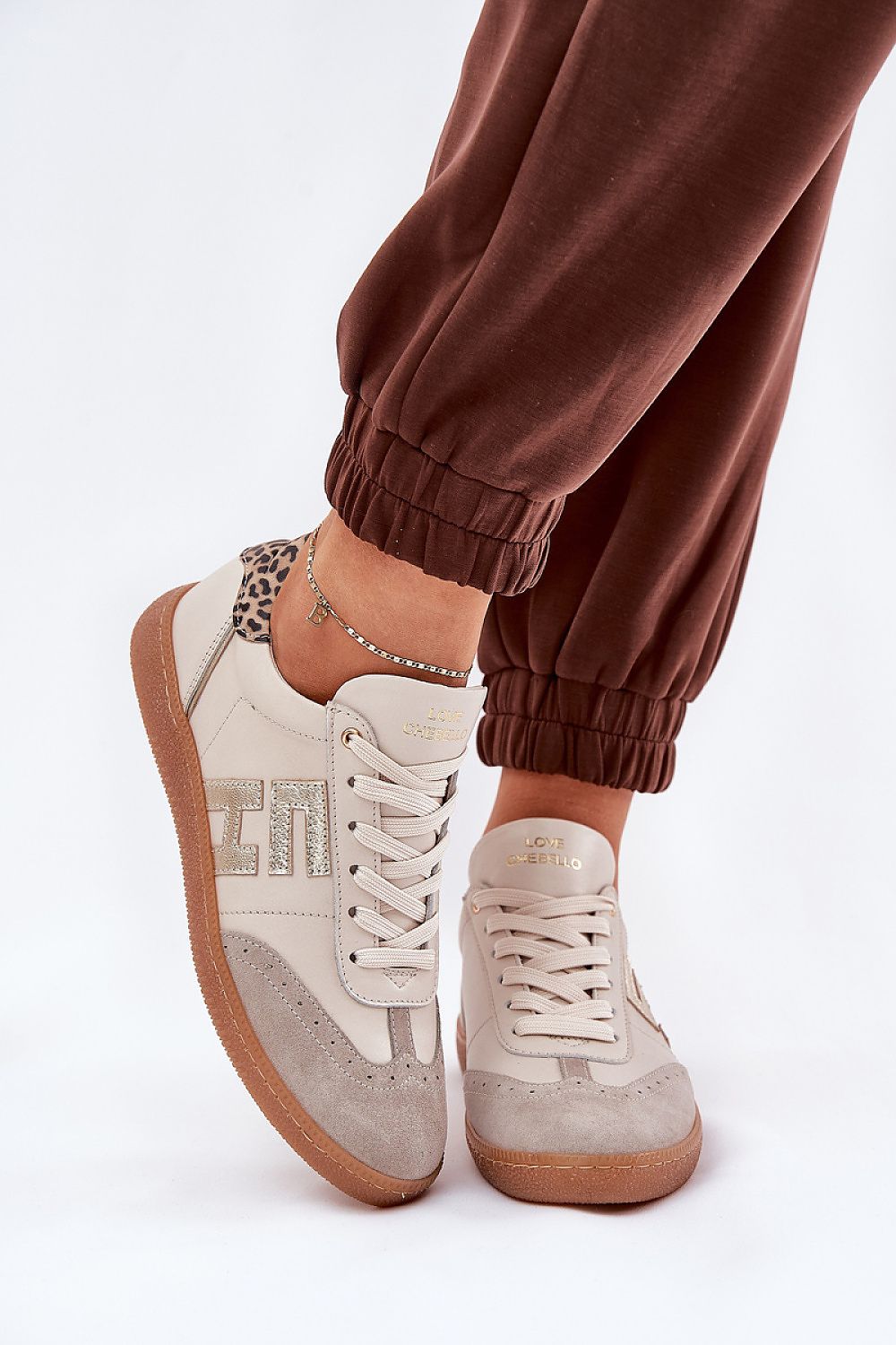 Luxury women's sports shoes made of natural leather and suede, designed by Step in Style, showcasing a casual and stylish look with rounded toes.