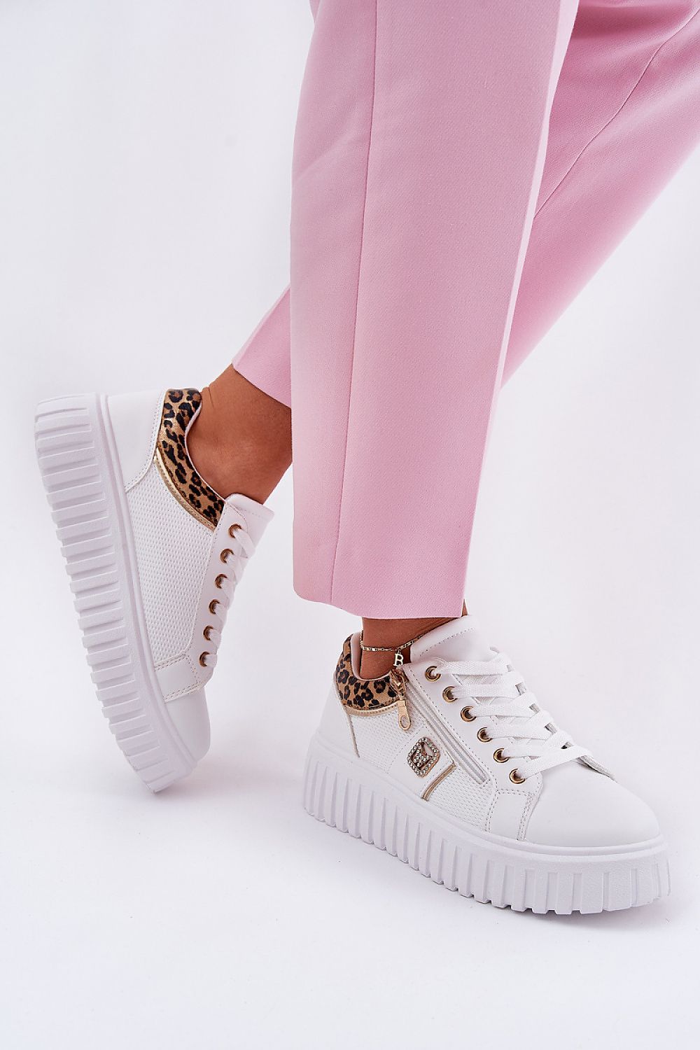 Luxury eco leather sport shoes with a stylish platform from Step in Style, featuring shiny details and a side zipper.