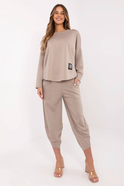 Close-up of Italy Moda Women's high-quality tracksuit fabric, showcasing the rich blend of viscose, cotton, and elastane for ultimate comfort.