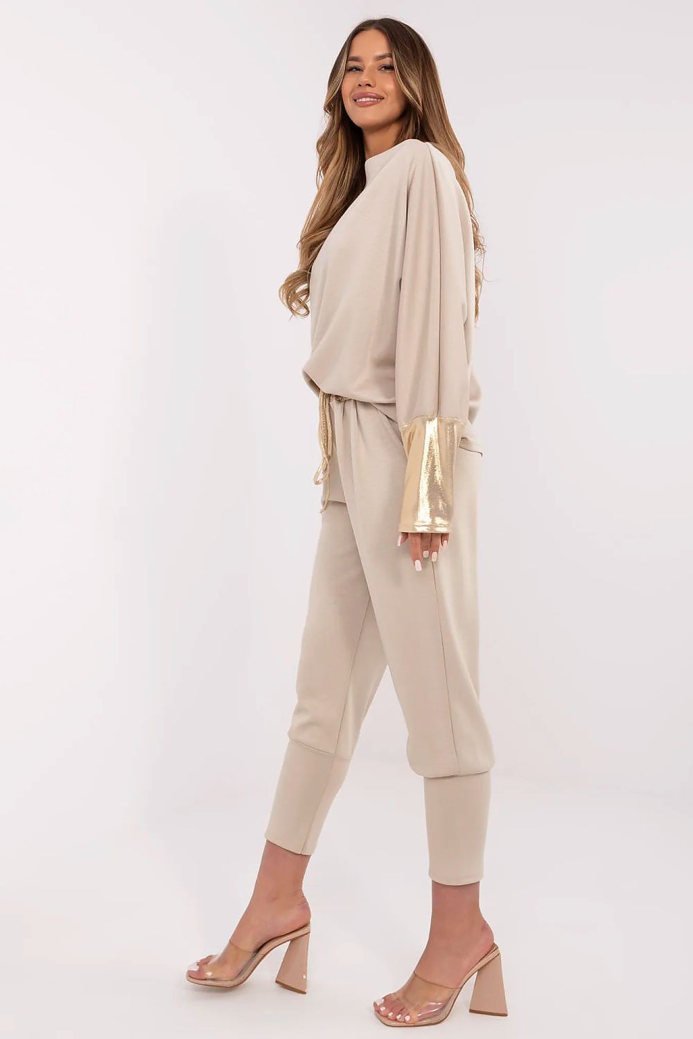 Chic high-waisted pants from Italy Moda, part of an elegant women's outfit that combines comfort and style, designed with a tie waist and side pockets.