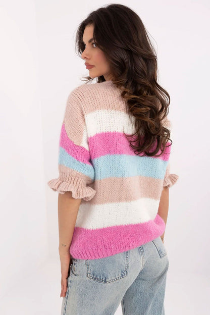 Model wearing the elegant women’s striped sweater by Italy Moda, highlighting its feminine design and comfortable fit ideal for various occasions.