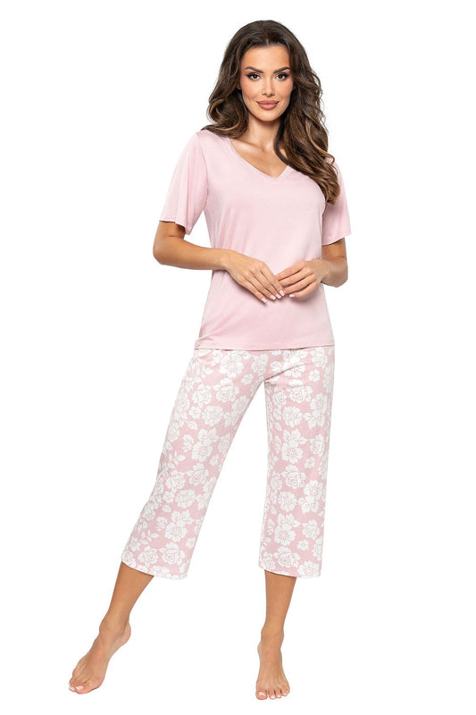 Elegant luxury women's cotton pyjamas set by Donna, featuring a stylish V-neck blouse and comfortable 3/4 pants, designed for ultimate comfort and sophistication.
