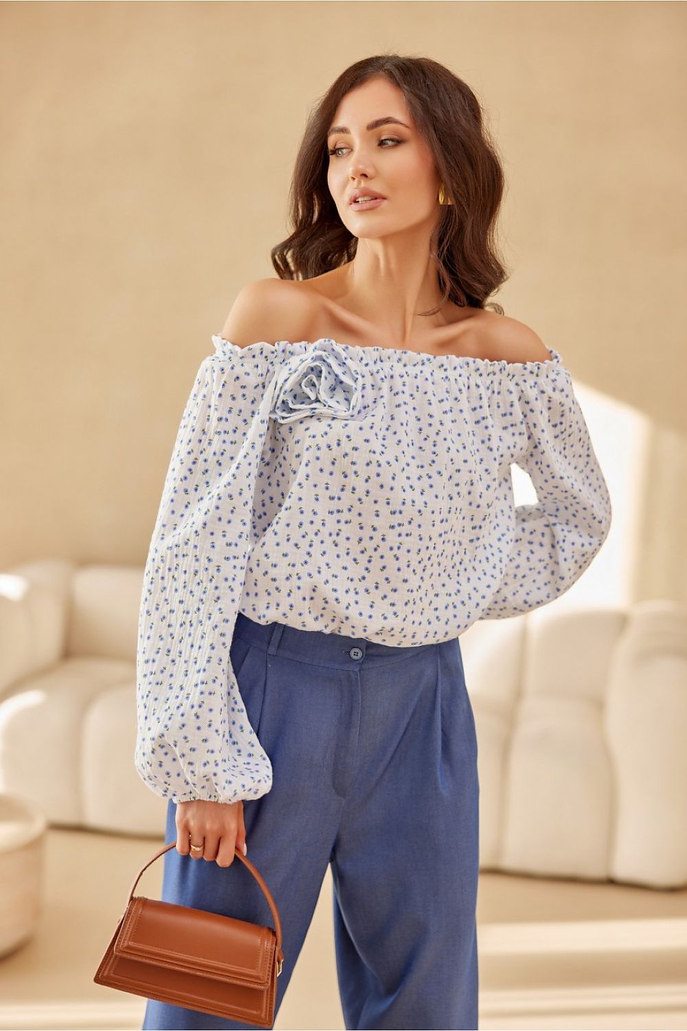 Elegant Roco Fashion blouse featuring adjustable neckline and puffy sleeves, made from 100% cotton, available in EU sizes 36-40 | US sizes 4-8, showcasing a sophisticated Spanish style.