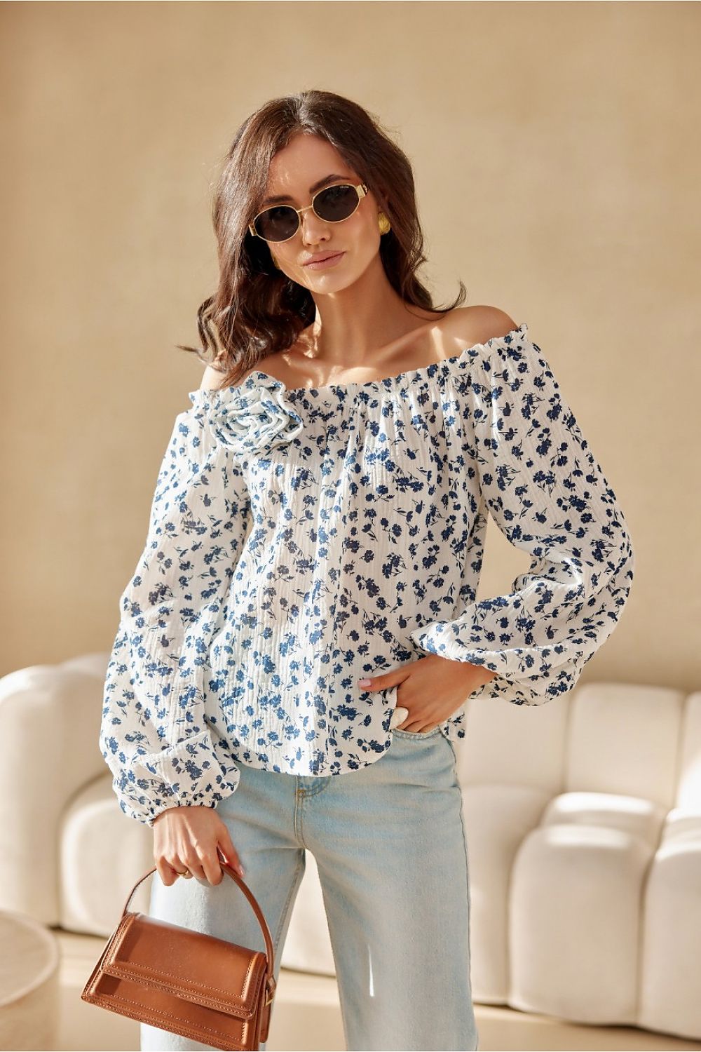 Model wearing the chic Roco Fashion Blouse, highlighting its adjustable neckline and flattering silhouette.
