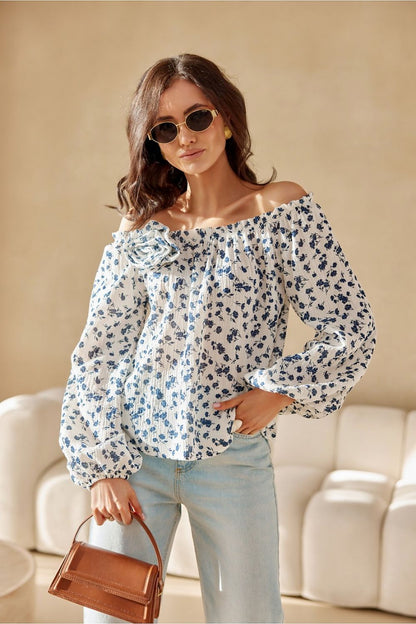 Model wearing the chic Roco Fashion Blouse, highlighting its adjustable neckline and flattering silhouette.
