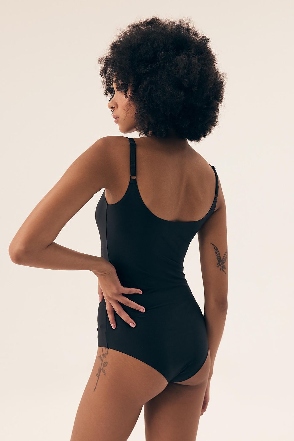 Sleek and elegant Henderson bodysuit showcasing laser-cut edges, ideal for a seamless look beneath any outfit.