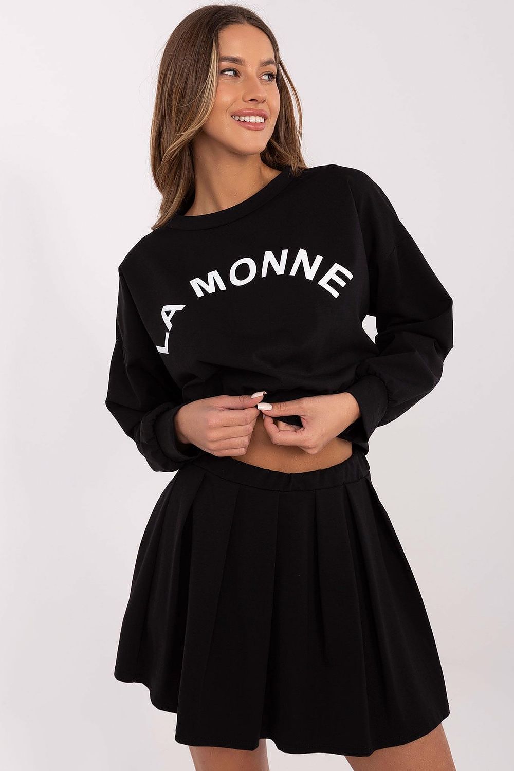Italy Moda stylish women's sweatshirt and pleated mini skirt set in EU size 0, showcasing elegant design and comfortable fit.