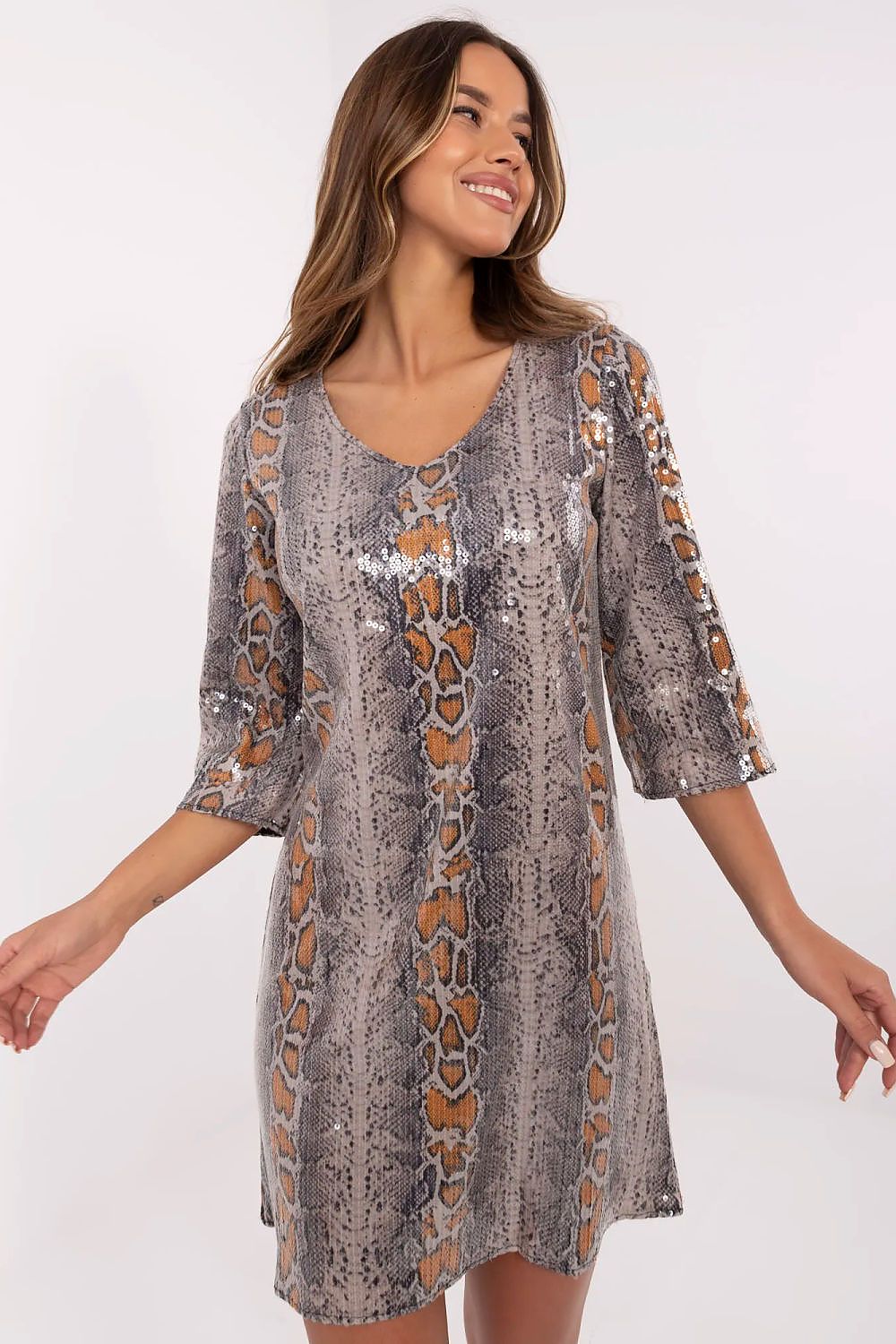 Elegant Lakerta evening dress featuring a beautiful sequin animal motif, perfect for cocktail events, showcasing a sophisticated modern classic style.