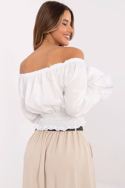 Lakerta elegant cotton blouse in Spanish style featuring ruffled long sleeves, perfect for a luxurious feminine look.