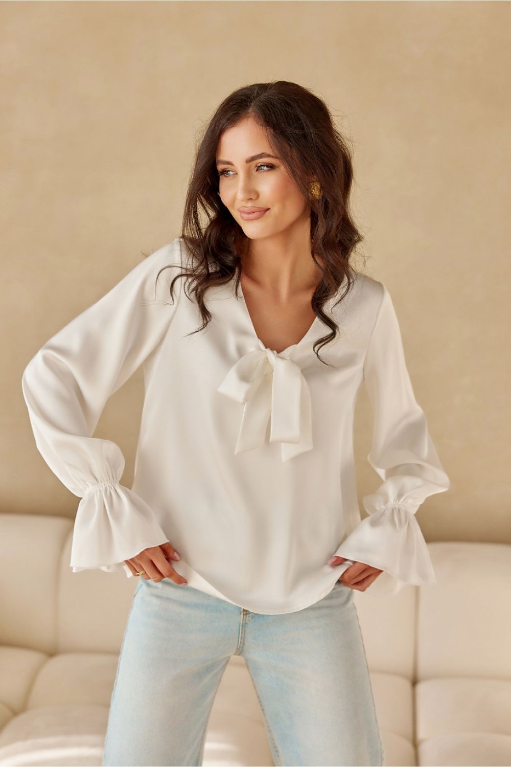 Fashion-forward Roco Fashion blouse with voluminous long sleeves, designed for sizes EU 36-40.