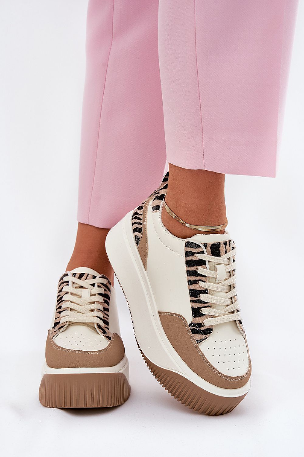 Chic eco leather women's sneakers from Step in Style, showcasing a unique animal print design and a comfortable 5cm platform for height and elegance.