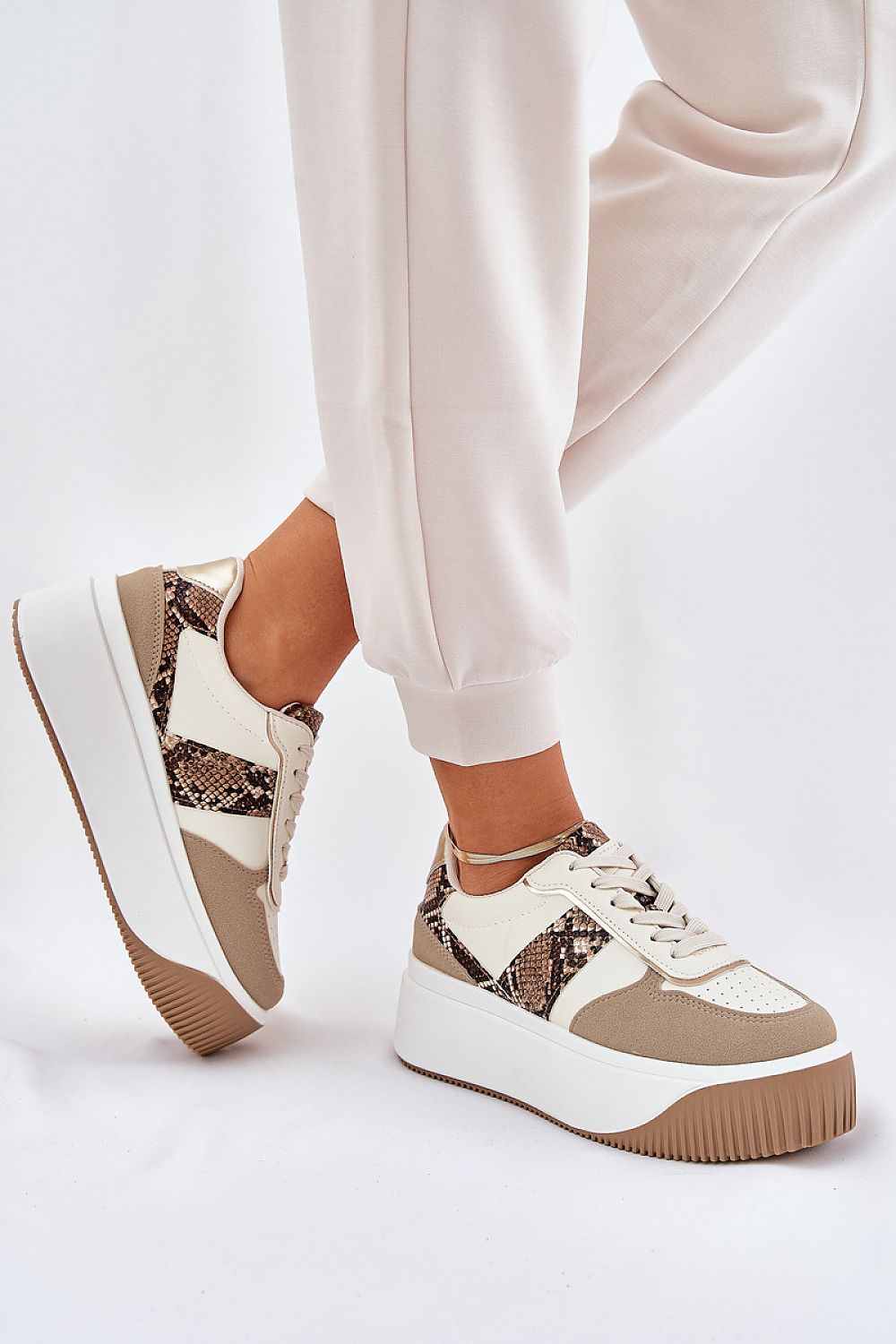 Luxurious stylish women's eco leather platform sneakers by Step in Style, featuring a comfortable foam insole and a modern rounded toe design, perfect for adding a chic touch to everyday outfits.