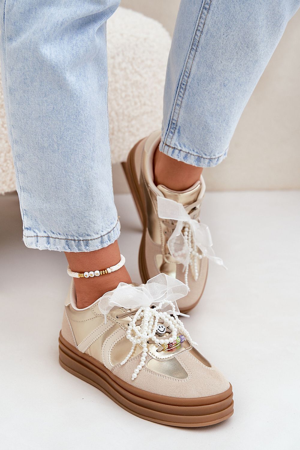 Step in Style's luxurious eco-suede platform sneakers showcasing unique charm laces, ideal for a chic and fashionable look.