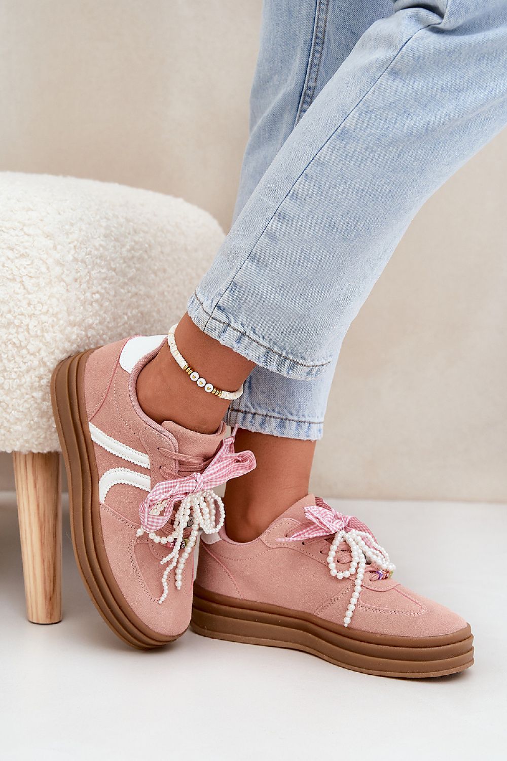 Chic eco-suede platform sneakers with unique charm laces from Step in Style, perfect for adding a touch of luxury to your casual ensemble.