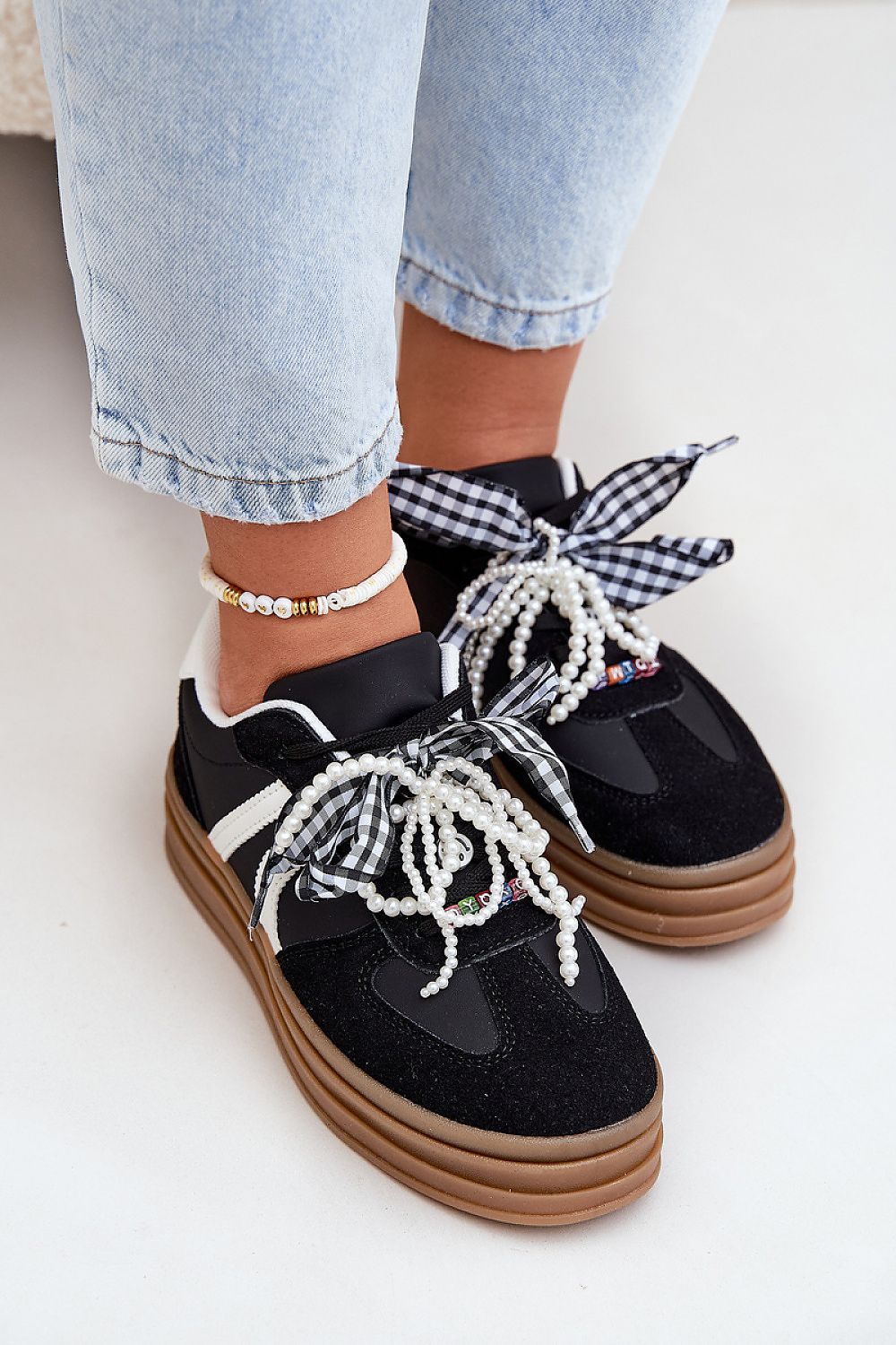 Elegant eco-suede platform sneakers from Step in Style, showcasing a chic design with unique charm laces for a fashionable touch.